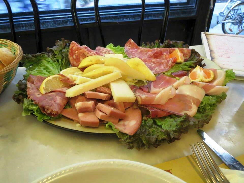 A platter of cheese and meat in Florence